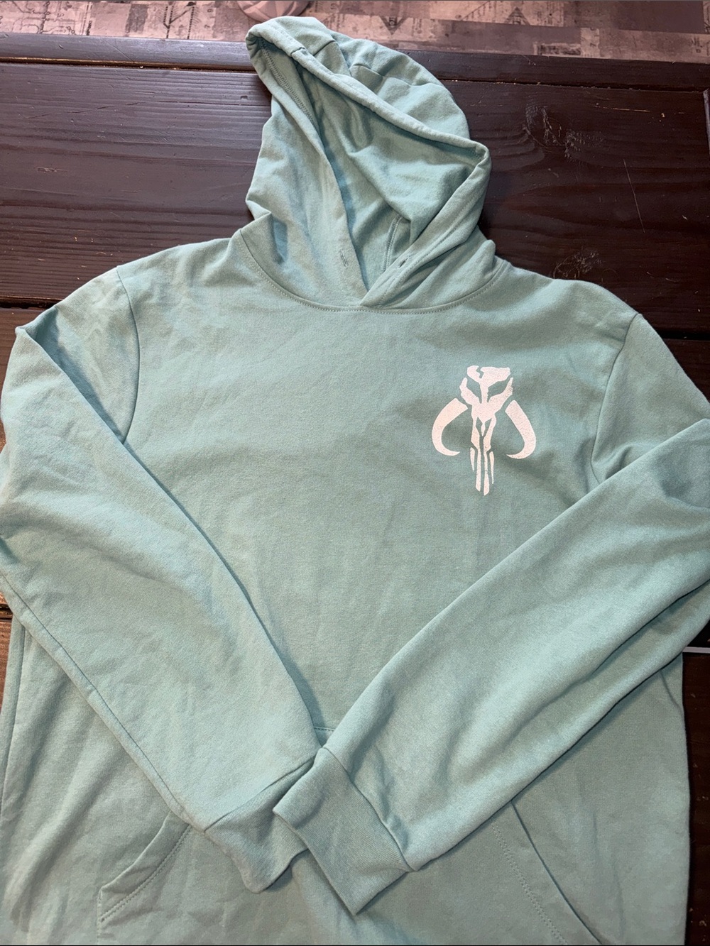 Star Wars Seafoam Green Pullover Hoodie with White Mythosaur Graphic